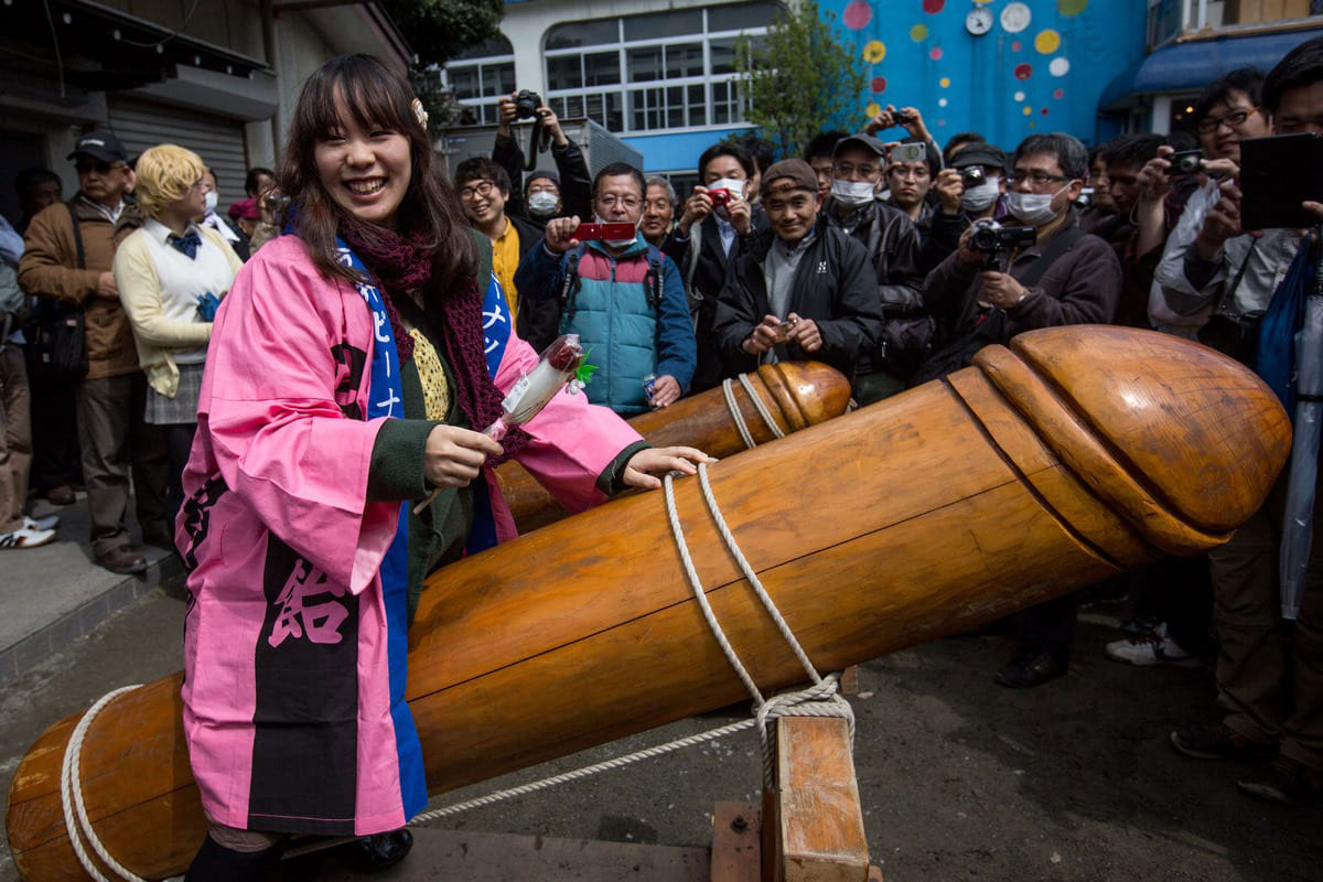 woman riding wooden penis