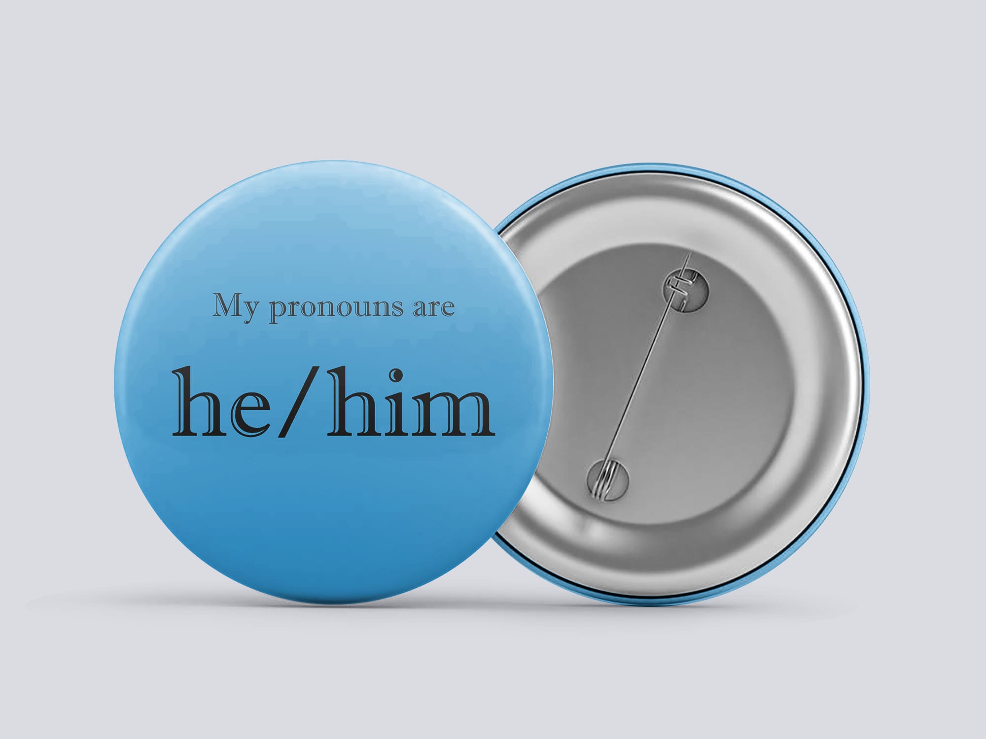 light blue he/him gender pronoun button by Explore Sex Talk